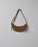 Vuori Arden Crescent Sling | Bourbon